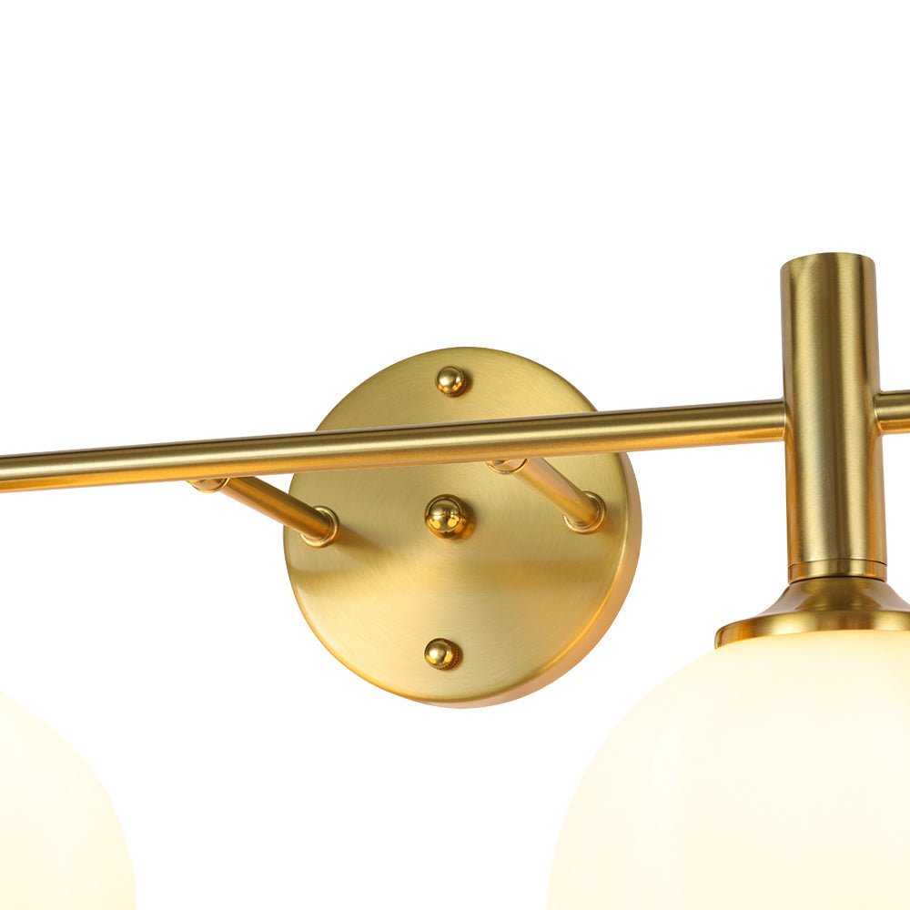 Mid-Century Brass 4-Light Glass Globe Vanity Sconce