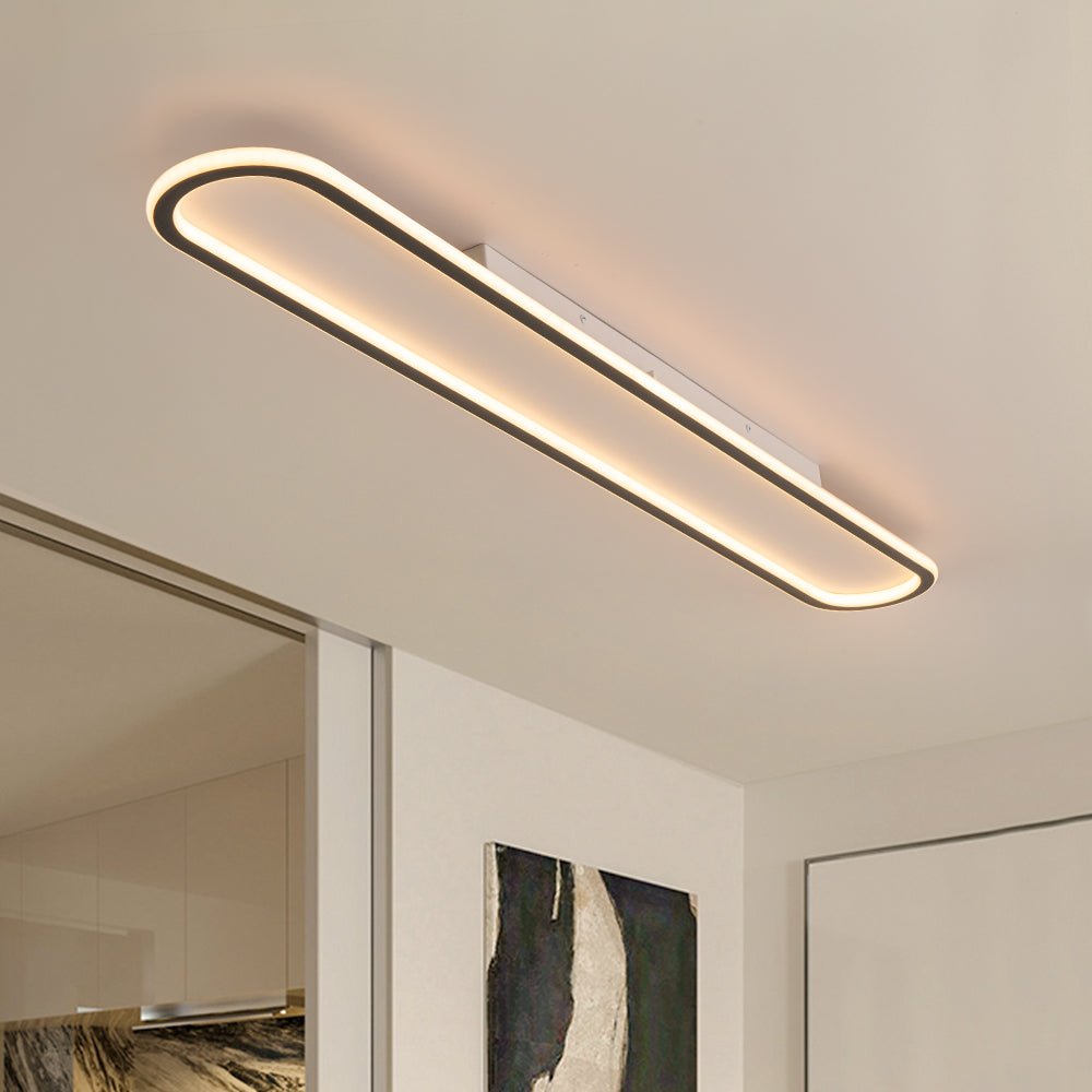 Minimalist Streamlined Oval Warm LED Ceiling Light