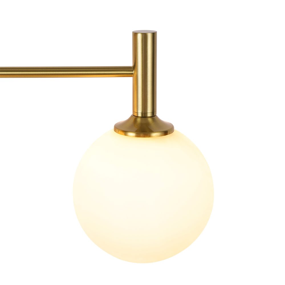 Mid-Century Brass 4-Light Glass Globe Vanity Sconce